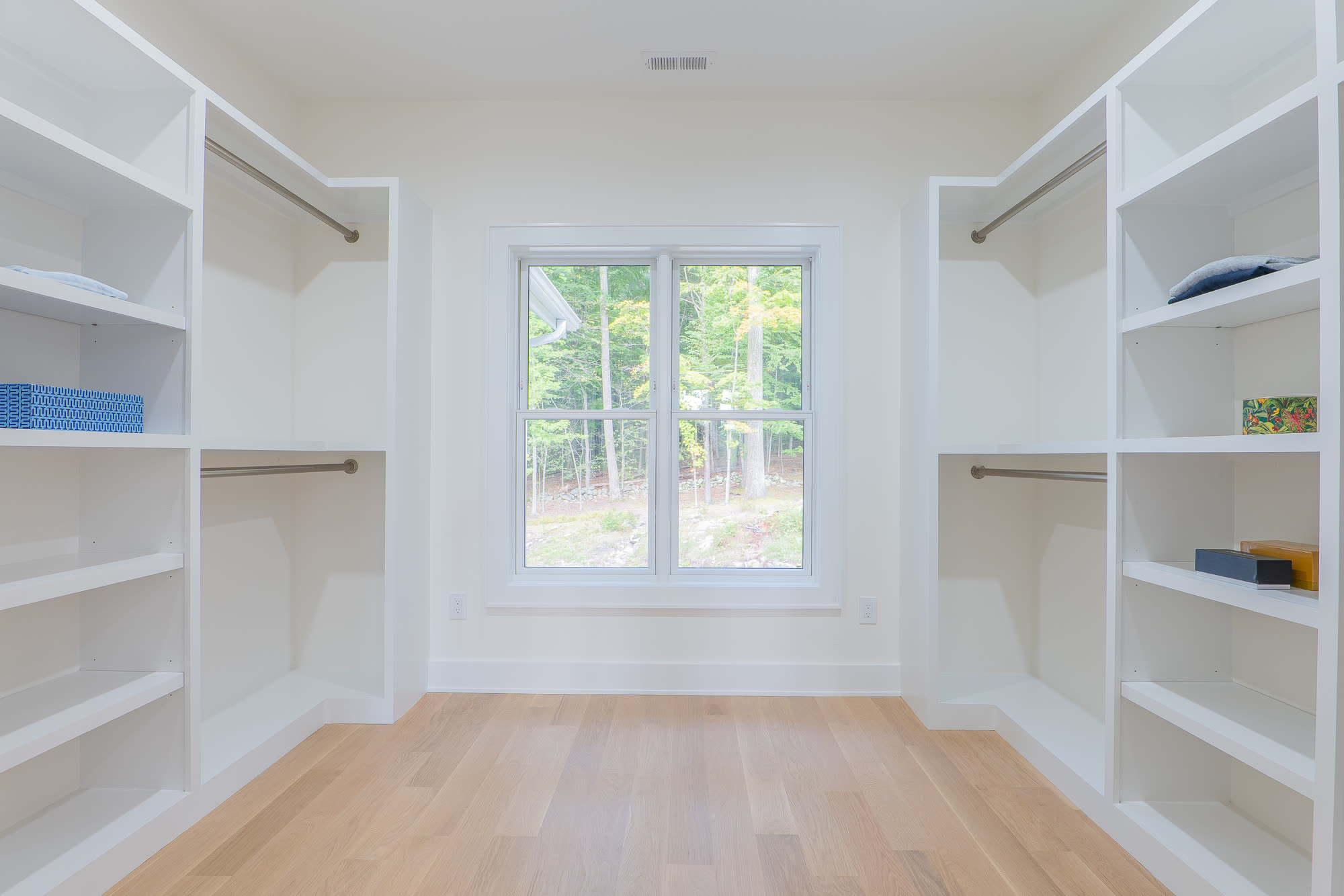 Walk-in closet with built-in shelving